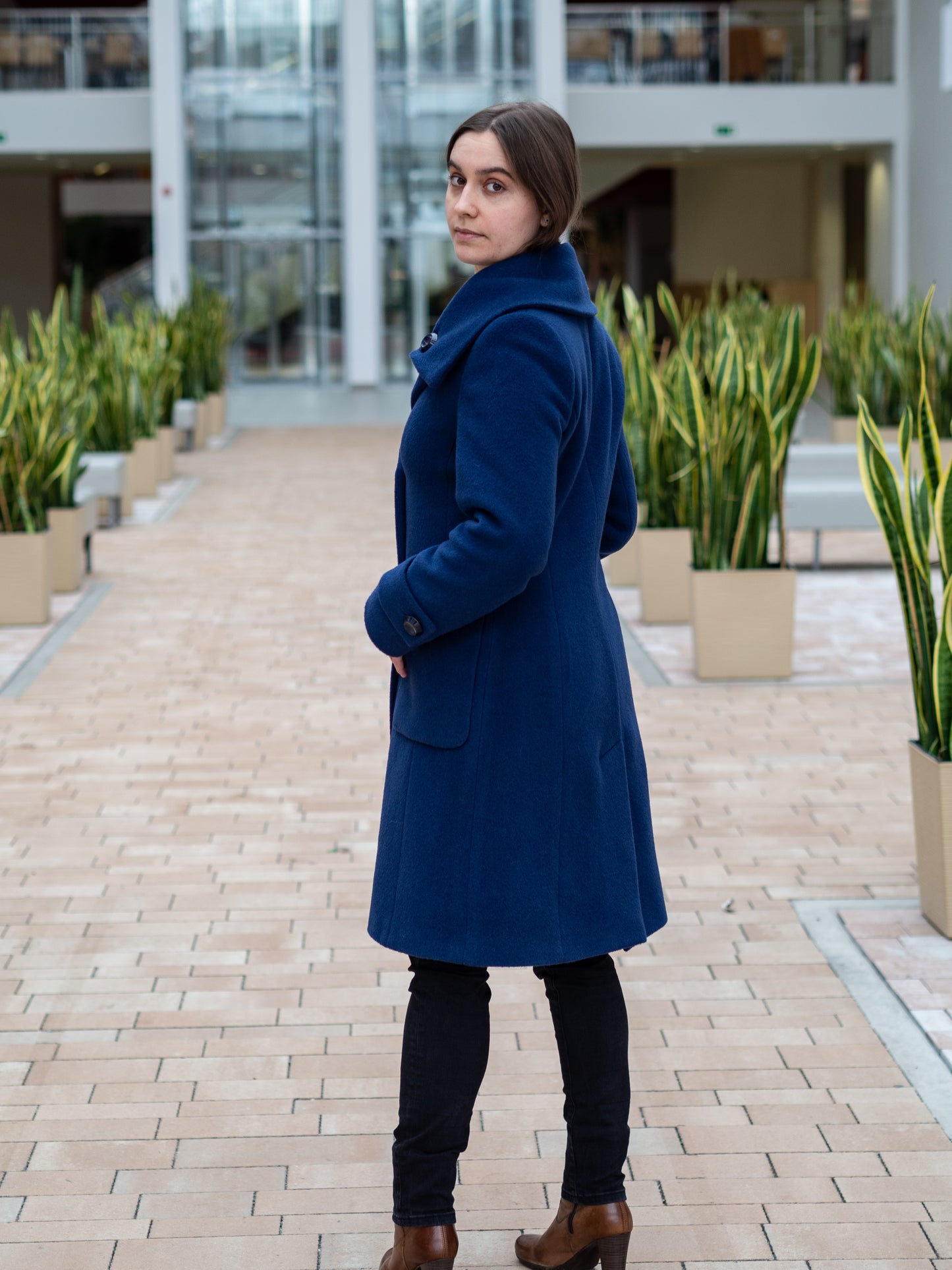 Double-breasted woolen belted coat